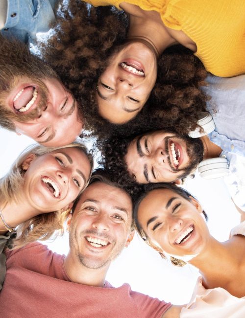 Multicultural group of friends in circle