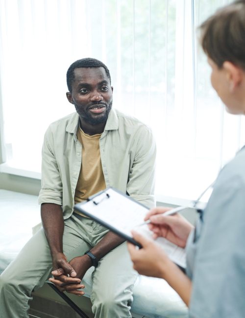 Patient talking to doctor